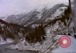 Image of Passenger train in snowy mountains United States USA, 1985, second 61 stock footage video 65675027198