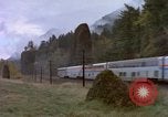 Image of Amtrak passenger train passing by United States USA, 1985, second 21 stock footage video 65675027205