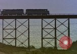 Image of Train on high trestle United States USA, 1985, second 10 stock footage video 65675027206
