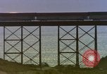 Image of Train on high trestle United States USA, 1985, second 15 stock footage video 65675027206