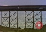Image of Train on high trestle United States USA, 1985, second 16 stock footage video 65675027206