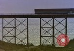 Image of Train on high trestle United States USA, 1985, second 17 stock footage video 65675027206