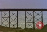 Image of Train on high trestle United States USA, 1985, second 23 stock footage video 65675027206
