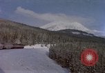 Image of Passenger train on snow covered mountain United States USA, 1985, second 1 stock footage video 65675027211