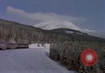 Image of Passenger train on snow covered mountain United States USA, 1985, second 3 stock footage video 65675027211