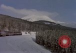 Image of Passenger train on snow covered mountain United States USA, 1985, second 4 stock footage video 65675027211
