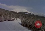 Image of Passenger train on snow covered mountain United States USA, 1985, second 5 stock footage video 65675027211