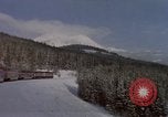 Image of Passenger train on snow covered mountain United States USA, 1985, second 6 stock footage video 65675027211