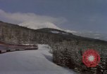Image of Passenger train on snow covered mountain United States USA, 1985, second 7 stock footage video 65675027211