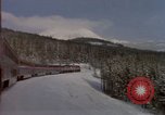 Image of Passenger train on snow covered mountain United States USA, 1985, second 8 stock footage video 65675027211