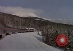Image of Passenger train on snow covered mountain United States USA, 1985, second 9 stock footage video 65675027211