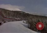 Image of Passenger train on snow covered mountain United States USA, 1985, second 10 stock footage video 65675027211