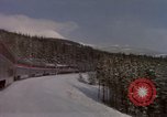 Image of Passenger train on snow covered mountain United States USA, 1985, second 11 stock footage video 65675027211