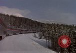 Image of Passenger train on snow covered mountain United States USA, 1985, second 12 stock footage video 65675027211