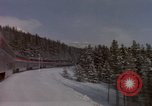 Image of Passenger train on snow covered mountain United States USA, 1985, second 14 stock footage video 65675027211