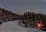 Image of Passenger train on snow covered mountain United States USA, 1985, second 17 stock footage video 65675027211