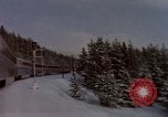 Image of Passenger train on snow covered mountain United States USA, 1985, second 18 stock footage video 65675027211