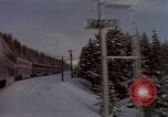 Image of Passenger train on snow covered mountain United States USA, 1985, second 20 stock footage video 65675027211