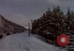 Image of Passenger train on snow covered mountain United States USA, 1985, second 21 stock footage video 65675027211