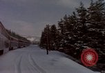 Image of Passenger train on snow covered mountain United States USA, 1985, second 22 stock footage video 65675027211