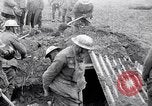 Image of British soldiers in bomb crater France, 1918, second 20 stock footage video 65675027224