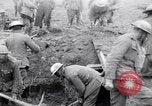 Image of British soldiers in bomb crater France, 1918, second 21 stock footage video 65675027224
