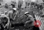 Image of British soldiers in bomb crater France, 1918, second 23 stock footage video 65675027224