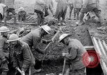 Image of British soldiers in bomb crater France, 1918, second 24 stock footage video 65675027224