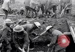 Image of British soldiers in bomb crater France, 1918, second 25 stock footage video 65675027224