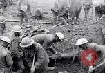 Image of British soldiers in bomb crater France, 1918, second 26 stock footage video 65675027224