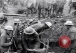 Image of British soldiers in bomb crater France, 1918, second 27 stock footage video 65675027224