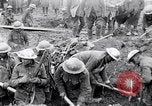 Image of British soldiers in bomb crater France, 1918, second 28 stock footage video 65675027224