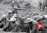 Image of British soldiers in bomb crater France, 1918, second 31 stock footage video 65675027224