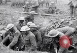 Image of British soldiers in bomb crater France, 1918, second 32 stock footage video 65675027224