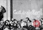 Image of British troops smiling beneath German sign in World War 1 France, 1917, second 8 stock footage video 65675027260