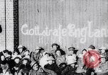 Image of British troops smiling beneath German sign in World War 1 France, 1917, second 10 stock footage video 65675027260