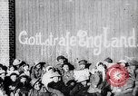 Image of British troops smiling beneath German sign in World War 1 France, 1917, second 11 stock footage video 65675027260
