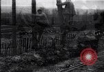 Image of French soldiers installing battlefield communications France, 1916, second 16 stock footage video 65675027286