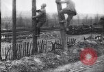 Image of French soldiers installing battlefield communications France, 1916, second 17 stock footage video 65675027286