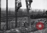 Image of French soldiers installing battlefield communications France, 1916, second 19 stock footage video 65675027286