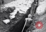 Image of French soldiers installing battlefield communications France, 1916, second 54 stock footage video 65675027286