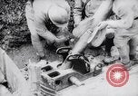 Image of French soldiers load shell on trench mortar France, 1916, second 14 stock footage video 65675027299
