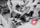Image of French soldiers load shell on trench mortar France, 1916, second 15 stock footage video 65675027299