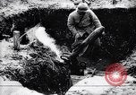 Image of French soldiers load shell on trench mortar France, 1916, second 17 stock footage video 65675027299