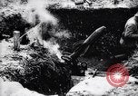Image of French soldiers load shell on trench mortar France, 1916, second 18 stock footage video 65675027299