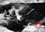 Image of French soldiers load shell on trench mortar France, 1916, second 19 stock footage video 65675027299