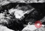 Image of French soldiers load shell on trench mortar France, 1916, second 21 stock footage video 65675027299