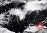 Image of French soldiers load shell on trench mortar France, 1916, second 23 stock footage video 65675027299