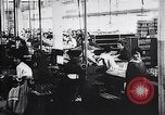 Image of French munitions factory workers in World War I France, 1915, second 15 stock footage video 65675027313