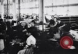 Image of French munitions factory workers in World War I France, 1915, second 18 stock footage video 65675027313